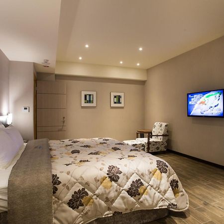 Verygood Business Hotel Huatan Pokoj fotografie