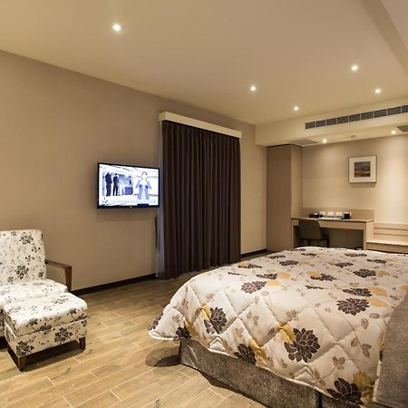 Verygood Business Hotel Huatan Pokoj fotografie