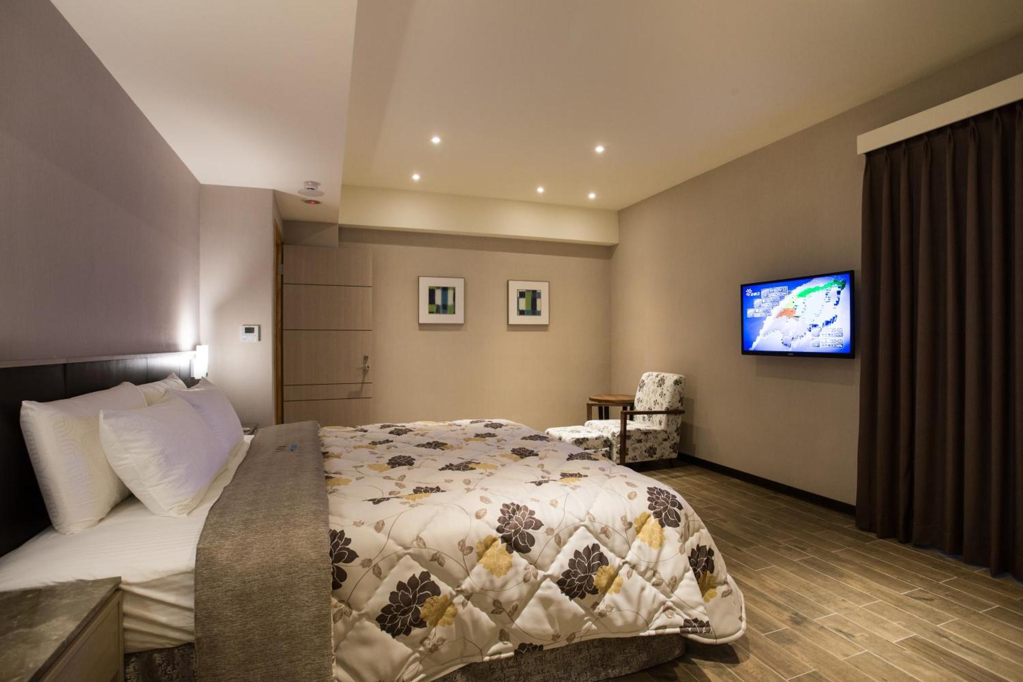 Verygood Business Hotel Huatan Pokoj fotografie