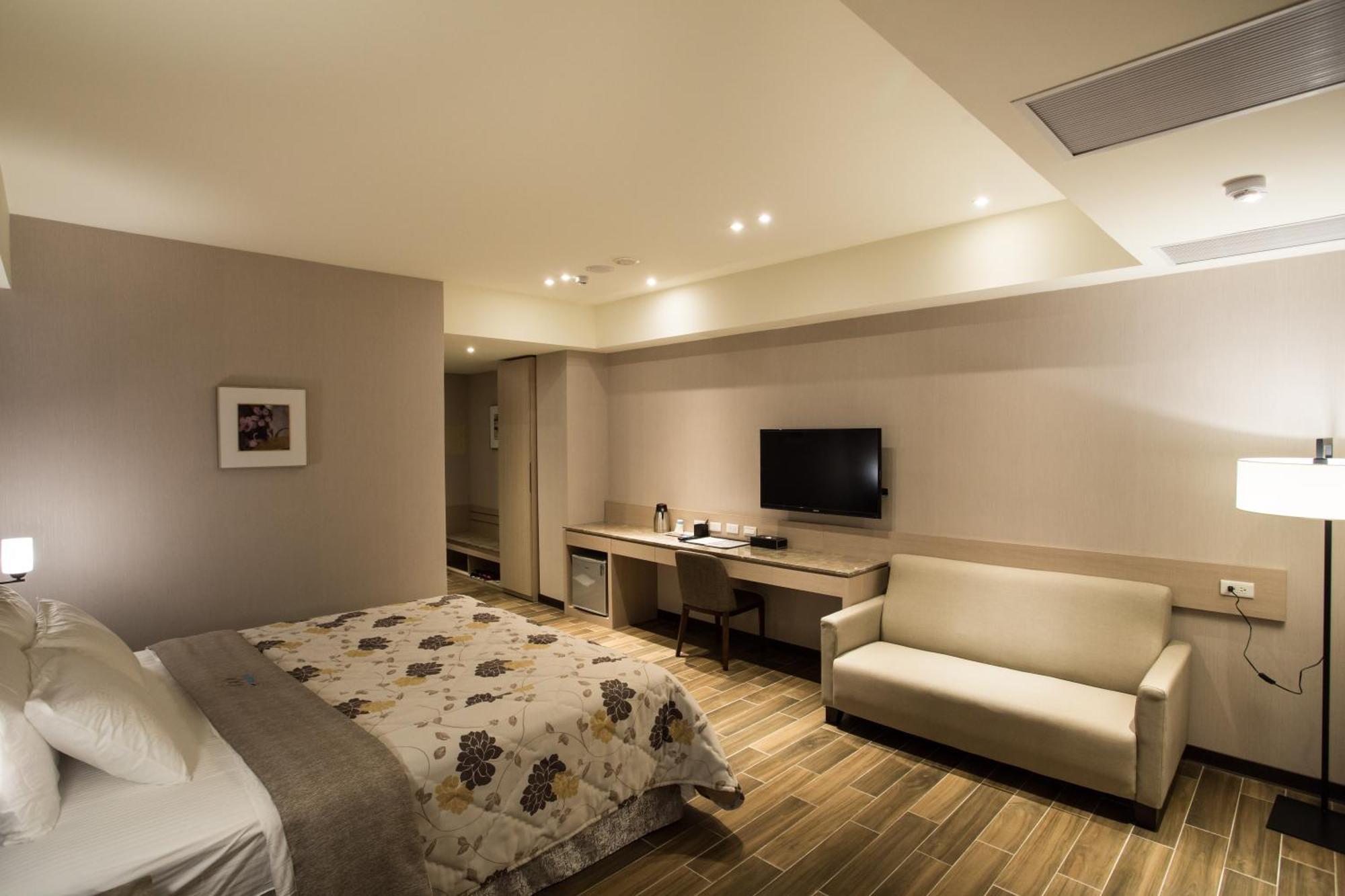 Verygood Business Hotel Huatan Pokoj fotografie