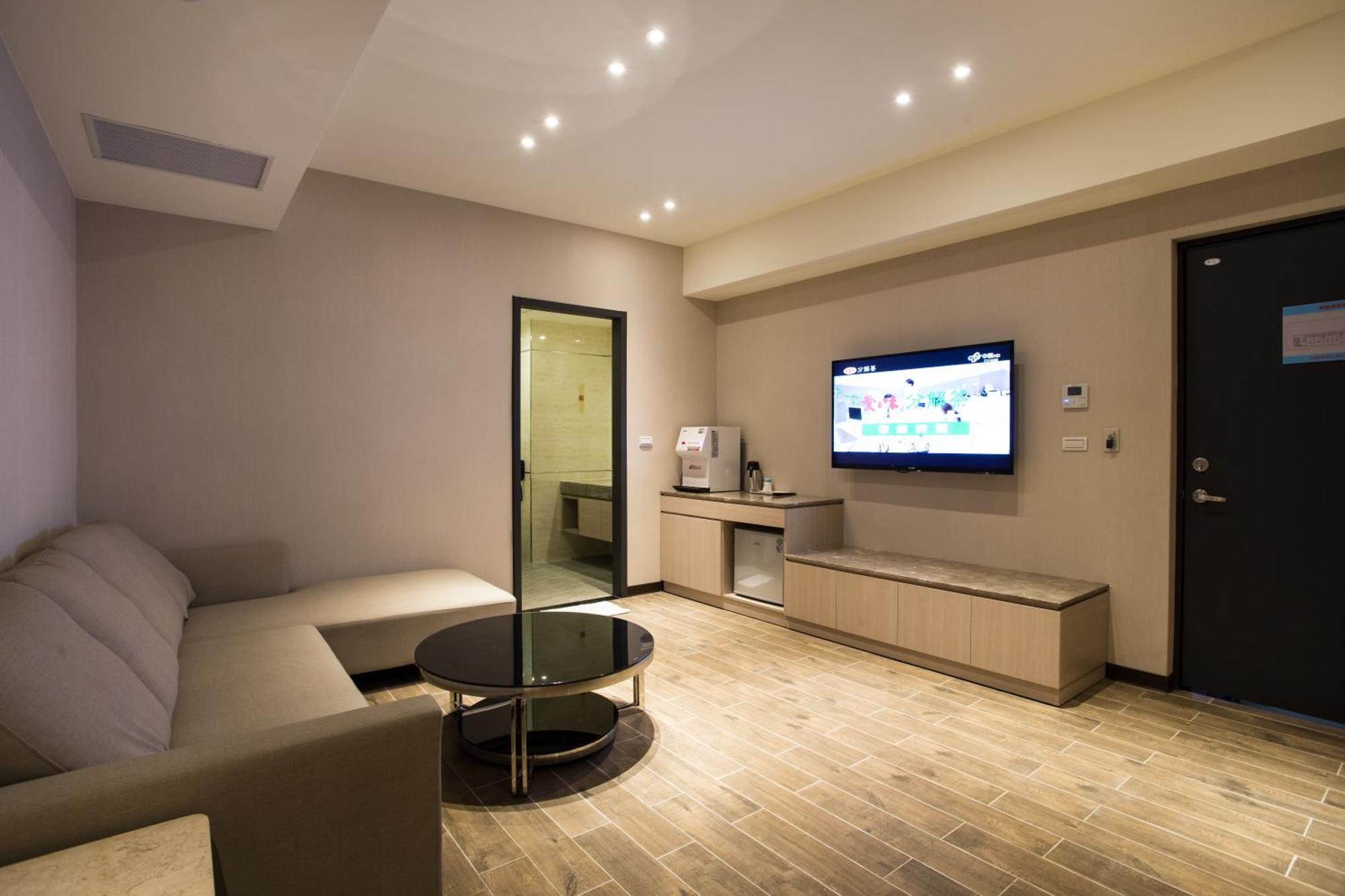 Verygood Business Hotel Huatan Pokoj fotografie