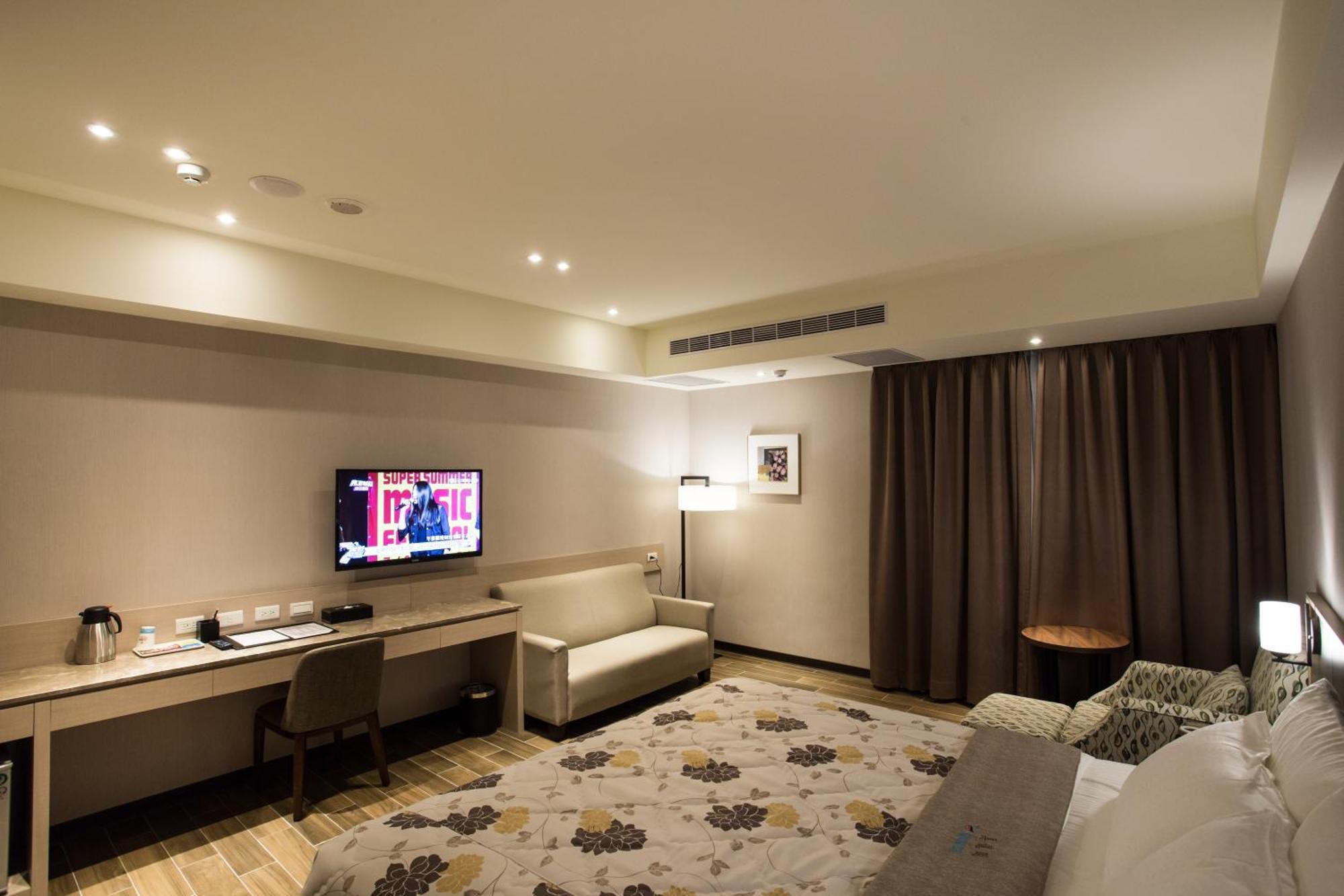 Verygood Business Hotel Huatan Pokoj fotografie