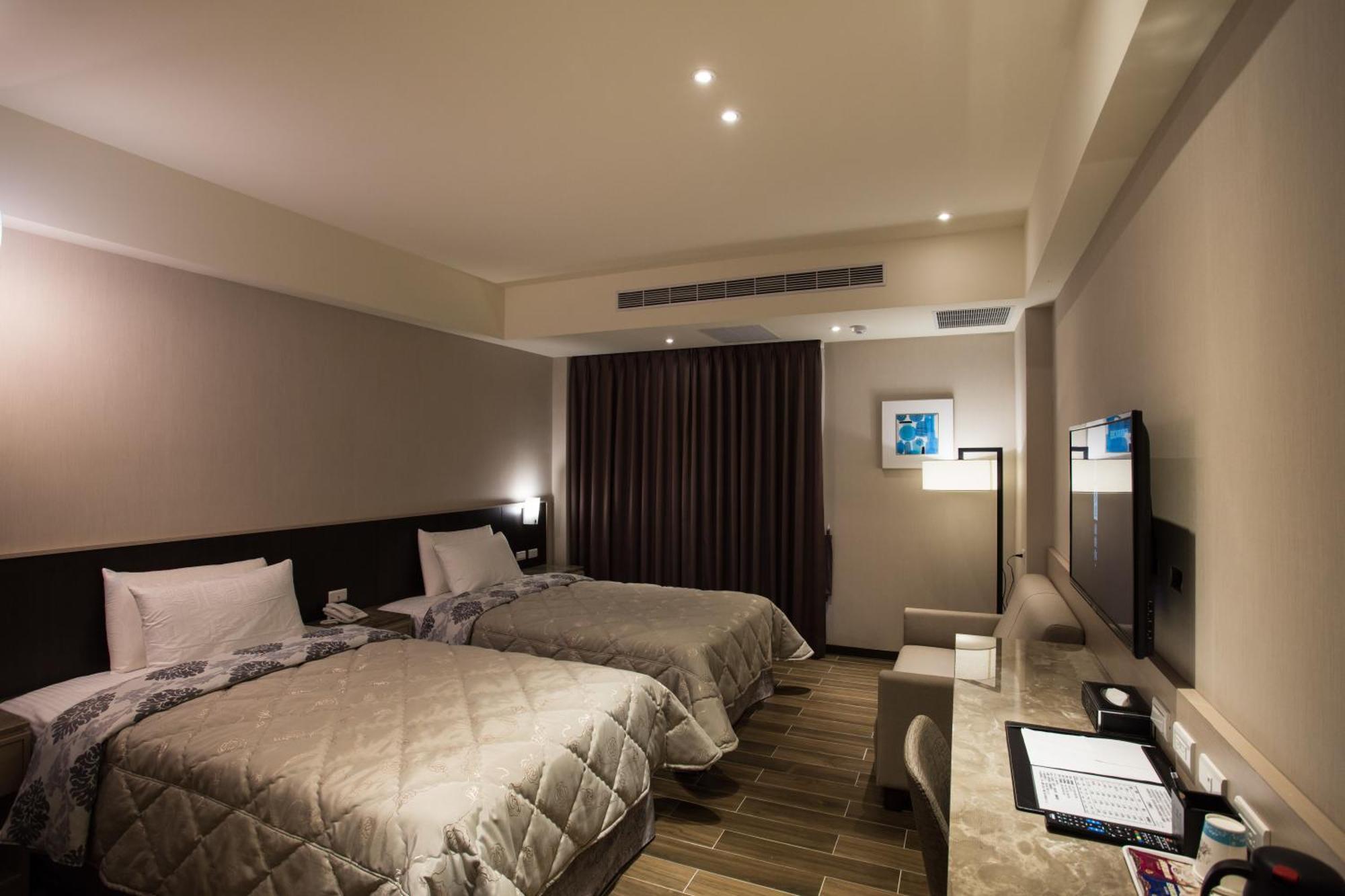 Verygood Business Hotel Huatan Pokoj fotografie