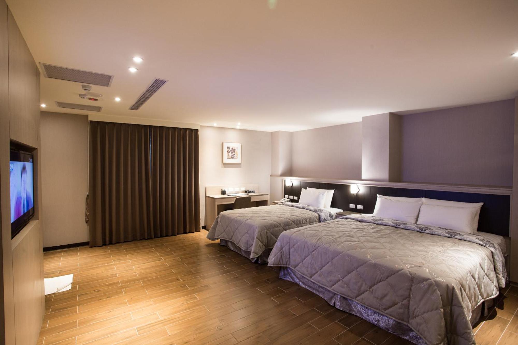 Verygood Business Hotel Huatan Pokoj fotografie