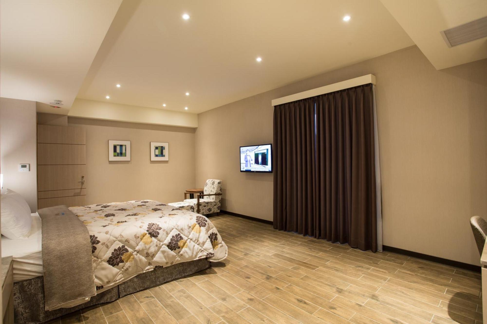 Verygood Business Hotel Huatan Pokoj fotografie